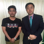 李光斗與經紀人李志合影